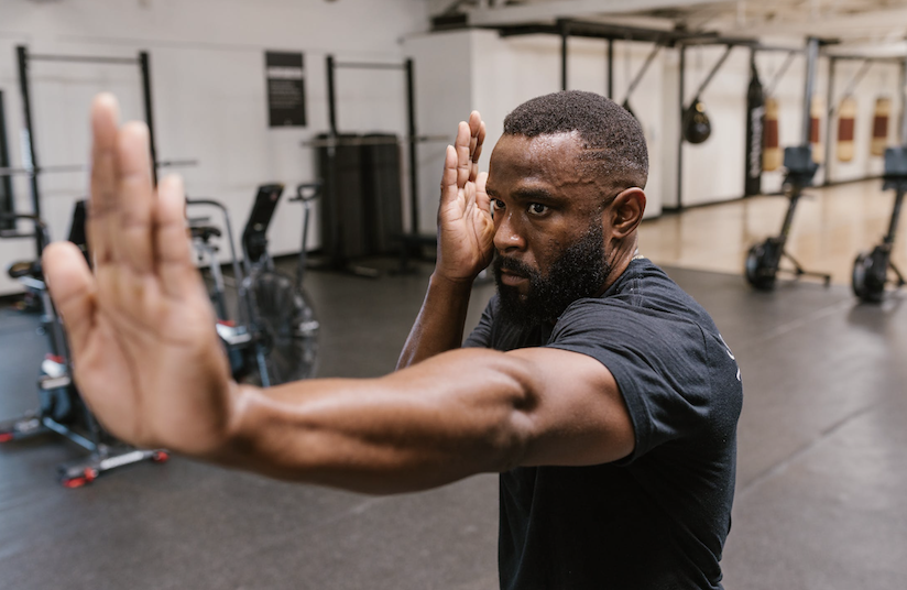 man practicing self-defense