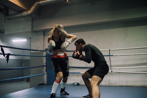martial arts girl practicing muay thai