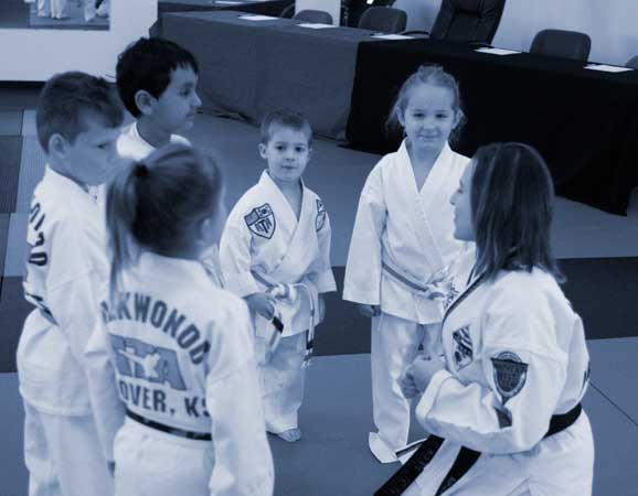 taekwondo instructor with students